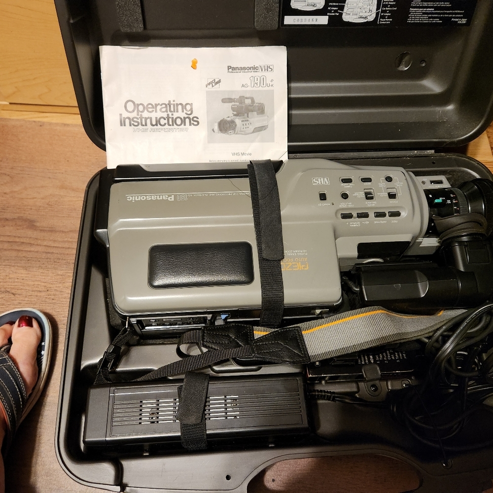 Professional Panasonic video recorder with playback, case and tripod